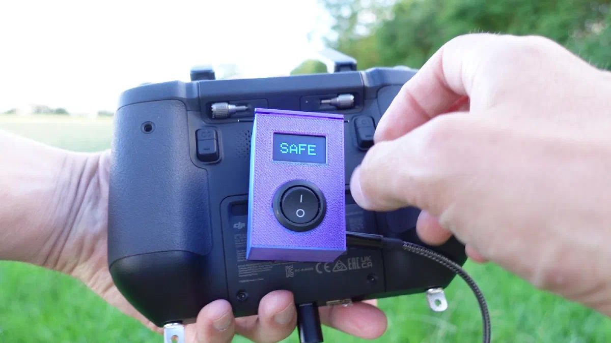 DJI dropper safety switch, showing the SAFE position